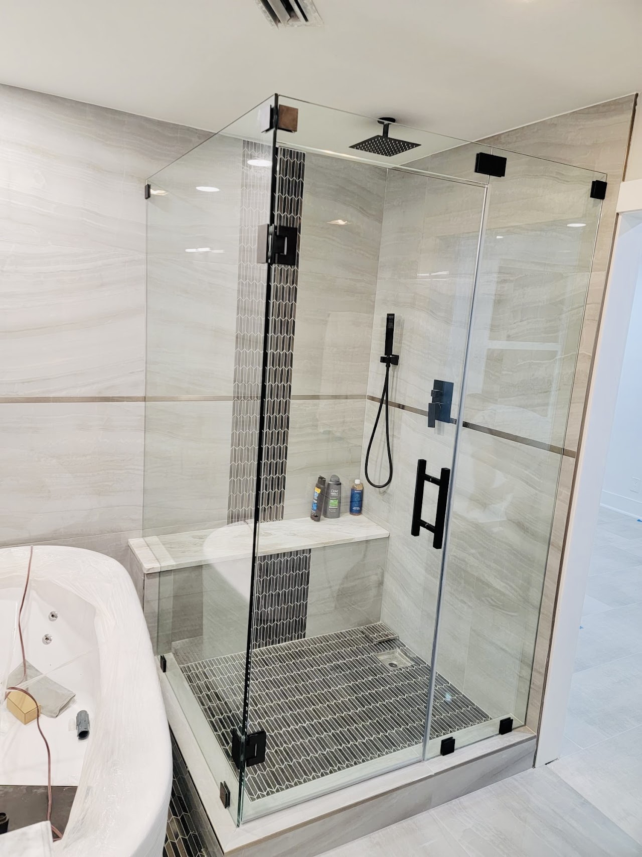 Another view of glass shower enclosure